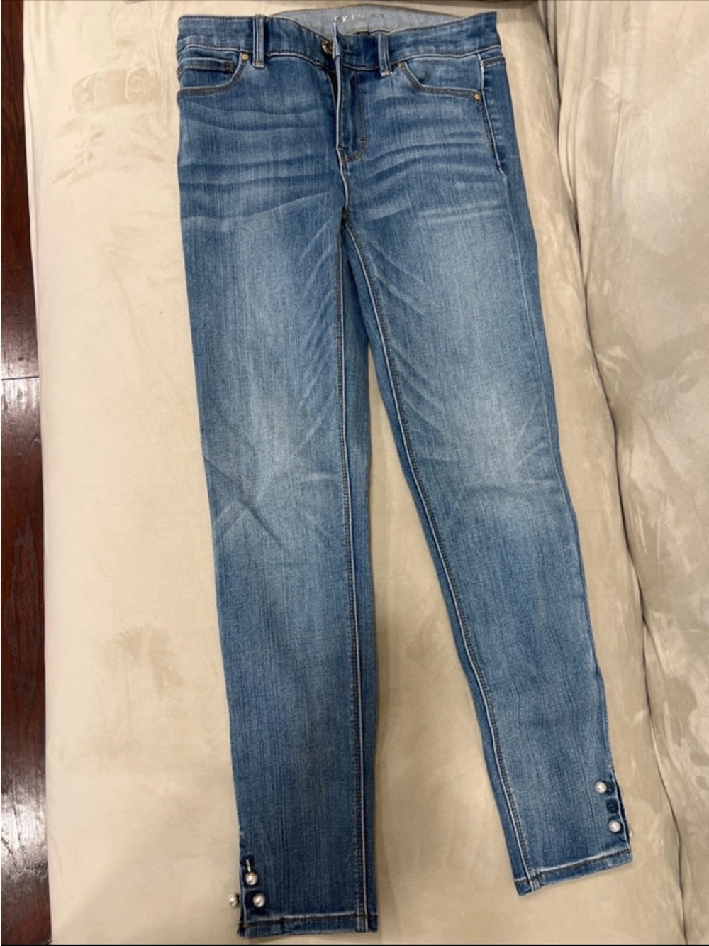 Women’s Skinny Jeans in Light Blue with Ankle Button Detail